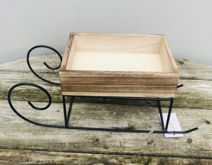 Dekorativer Metallschlitten