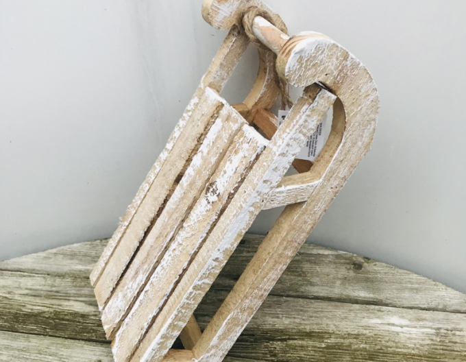 Dekorativer Holzschlitten