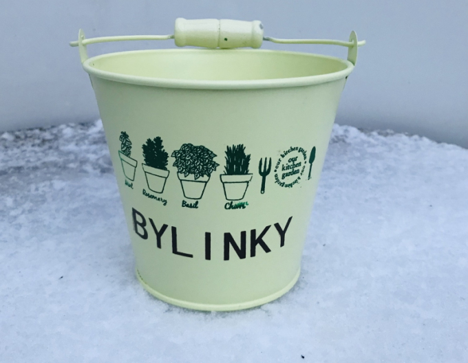 Kräutertopf aus Metall in Gelb